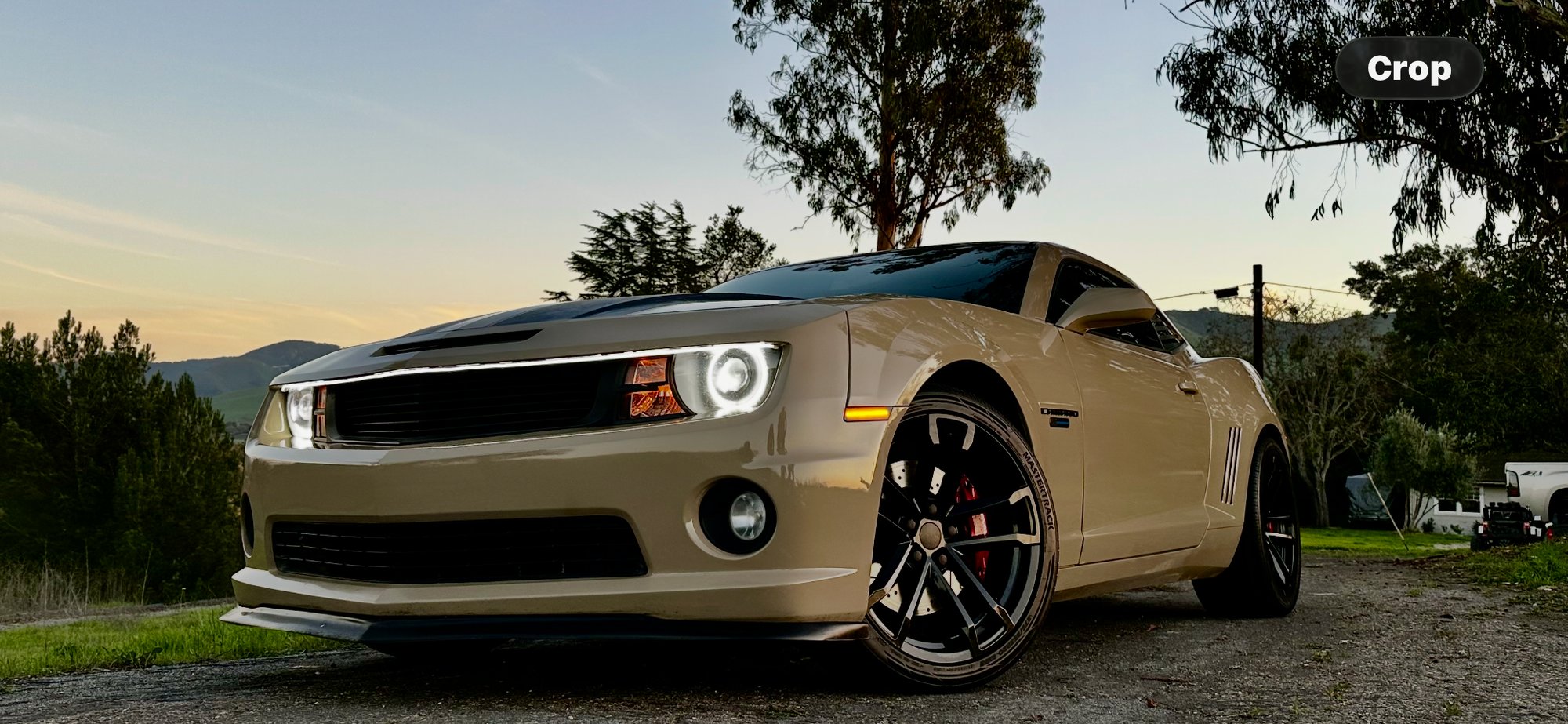 The Camaro - halo headlights at dusk